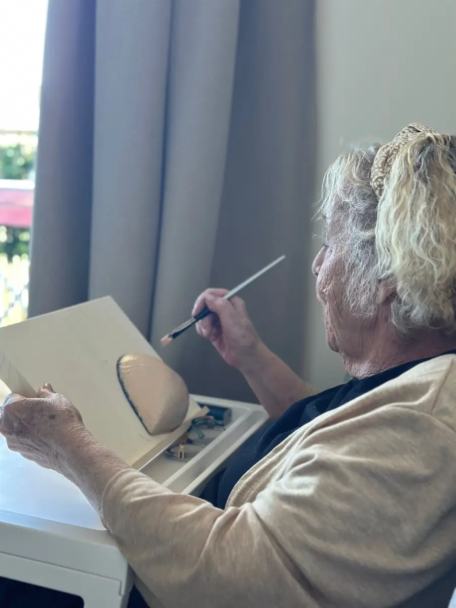 Haven Care caregiver supporting a client with dementia at home